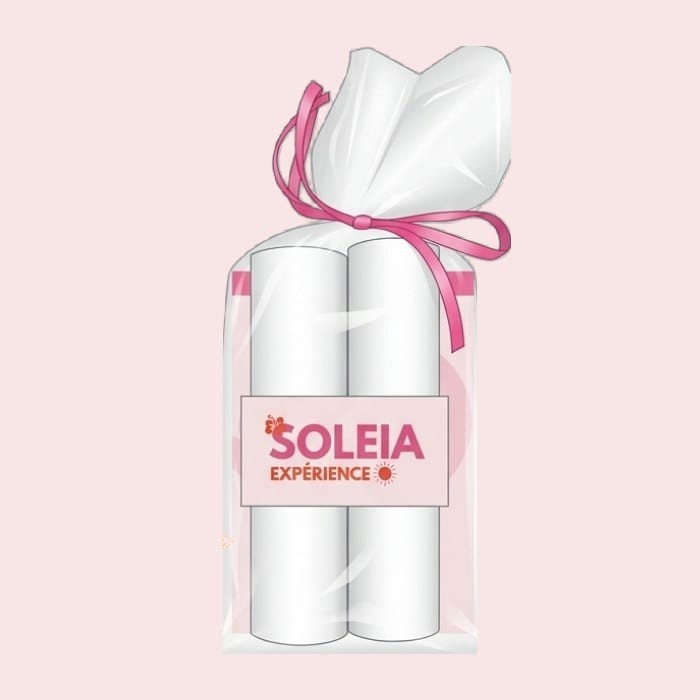 Le Kit Soleia : un joli sachet transparent noué d'un ruban rose, avec ses carnets